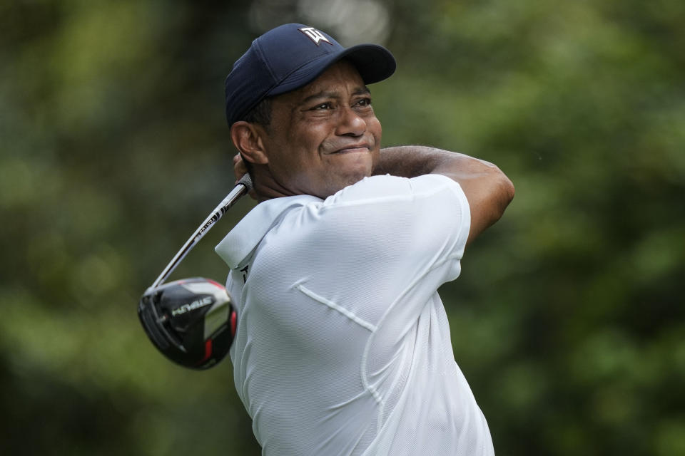 Tiger Woods watches his tee shot on the 11th hole during the first round of the Masters golf tournament at Augusta National Golf Club on Thursday, April 6, 2023, in Augusta, Ga. (AP Photo/Charlie Riedel)