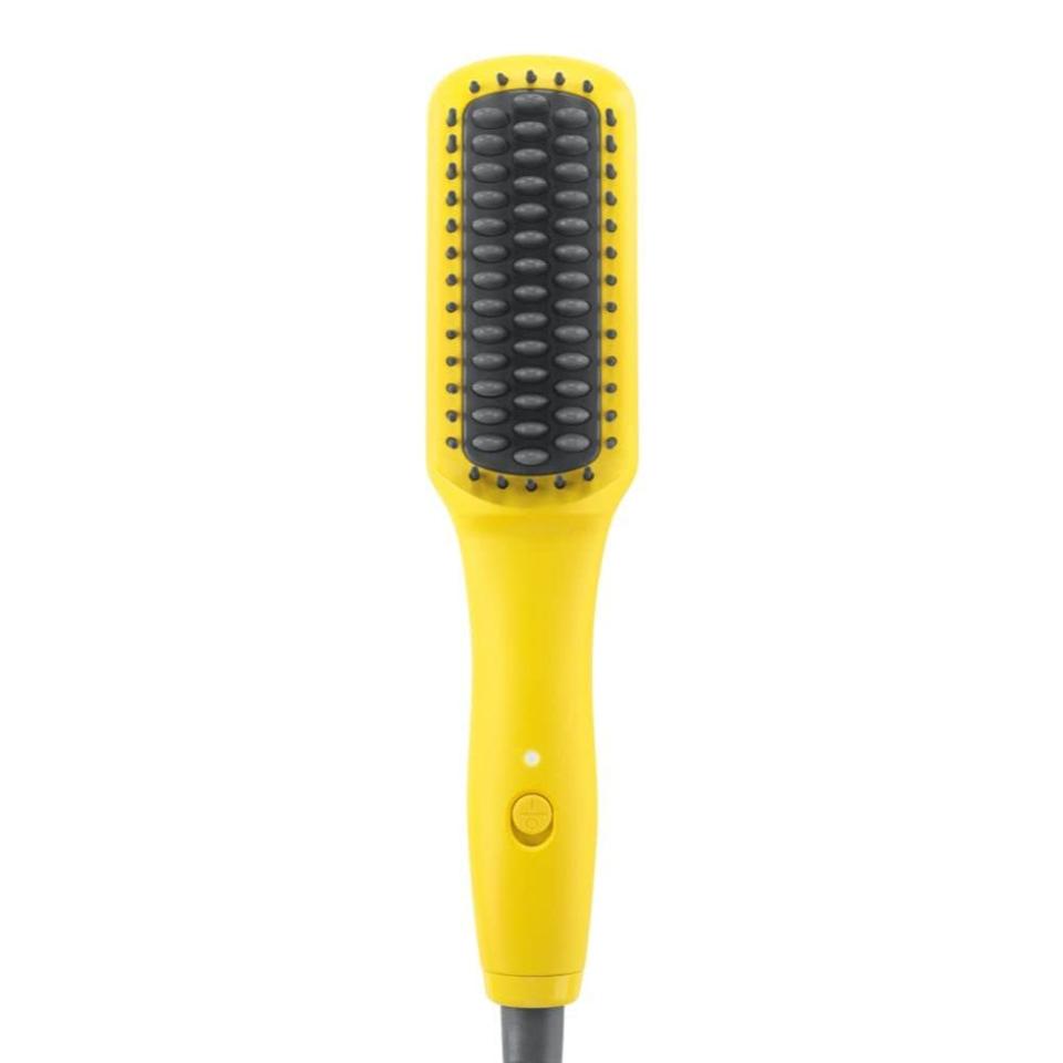 Cute as a button, this baby brush is the traveling companion you've been waiting for. (Photo: Amazon)