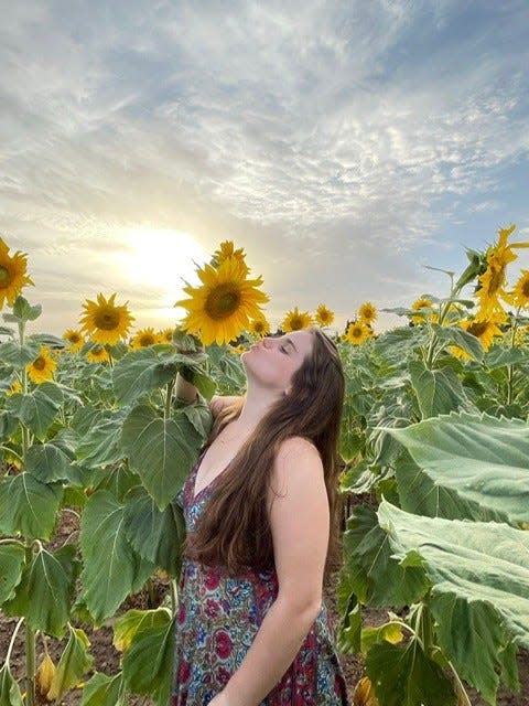 In happier days before the Oct. 7 terror attack, Tali Gilberg struck a playful pose in a sunflower field in Israel. She moved from Livingston, NJ, four years ago, eventually settling on a kibbutz in southern Israel.
