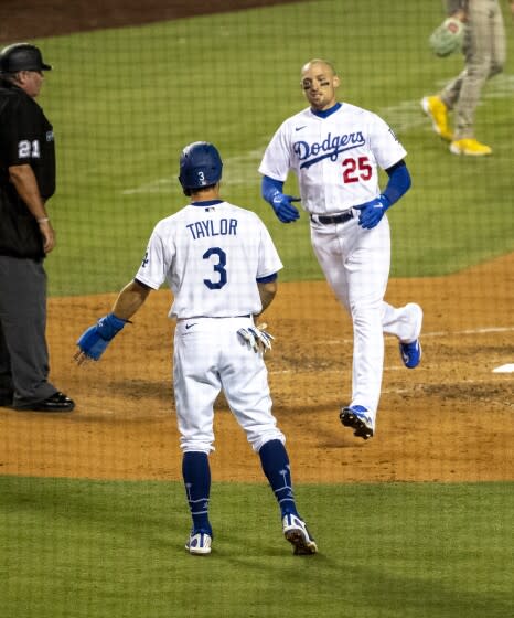 Los Angeles Dodgers third baseman Hanser Alberto (17) throws to