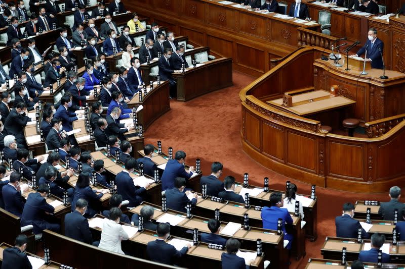 Japanese Prime Minister Yoshihide Suga gives his first policy speech in parliament in Tokyo