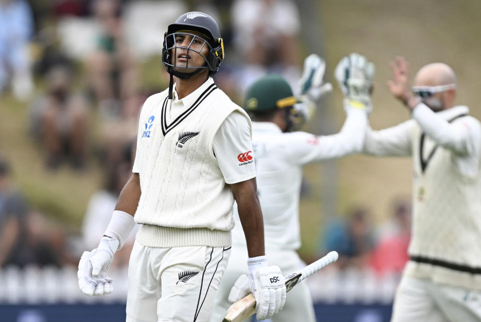 New Zealand Rachin Ravindra walks off after he is dismissed by Australia's Nathan Lyon on the fourth day of their cricket test match in Wellington, New Zealand, Sunday, March 3, 2024. (Andrew Cornaga/Photosport via AP)