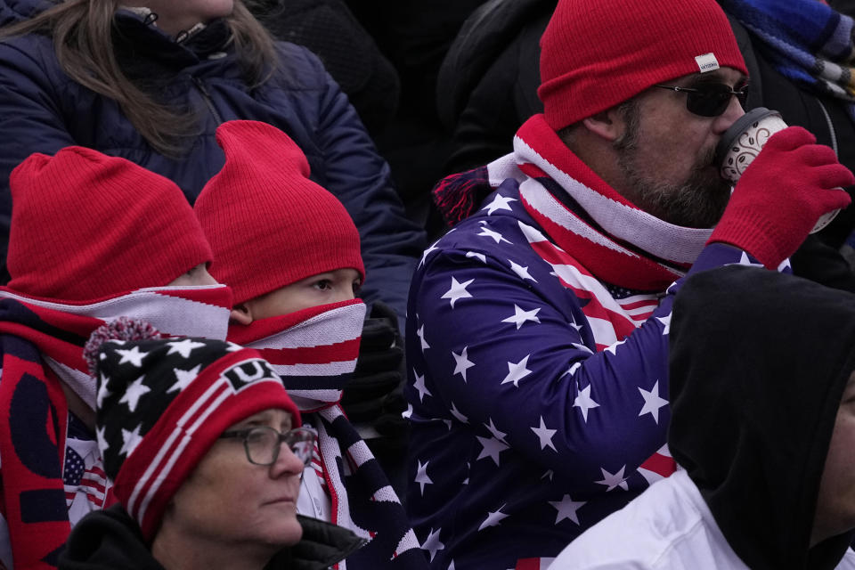 Fans bundle up for the cold during the second half of an international friendly soccer match between Slovenia and the United States in San Antonio, Saturday, Jan. 20, 2024. (AP Photo/Eric Gay)