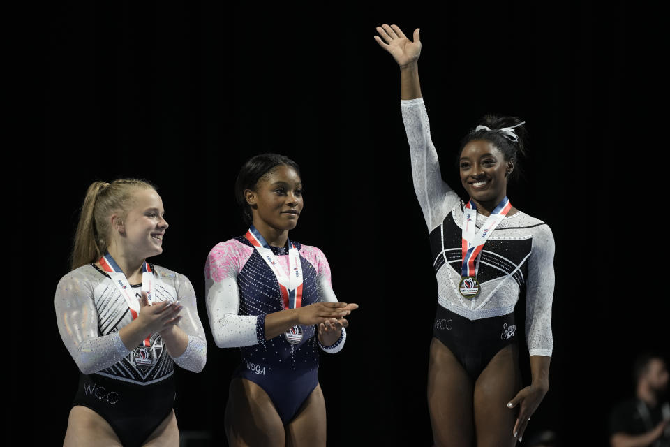 Simone Biles reacts after winning in the floor exercise at the U.S. Classic gymnastics competition Saturday, Aug. 5, 2023, in Hoffman Estates, Ill. (AP Photo/Morry Gash)