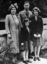 <p>King George VI, his wife Queen Elizabeth and their two daughters, Princess Elizabeth (right) and Princess Margaret (PA Archive) </p>