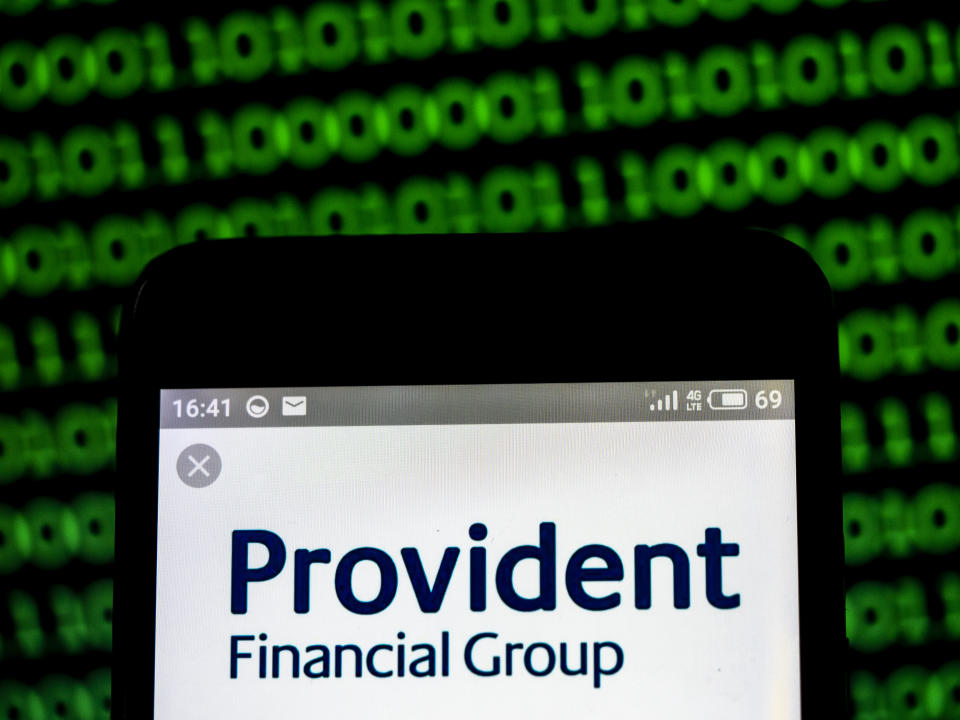 UKRAINE - 2019/03/19:  In this photo illustration, the Provident Financial Group plc company logo seen displayed on a smartphone. (Photo Illustration by Igor Golovniov/SOPA Images/LightRocket via Getty Images)