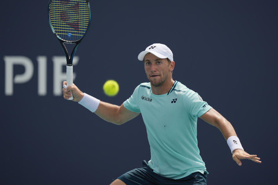 Casper Ruud, of Norway, plays a ball from Nicolas Jarry, of Chile, in their men's singles fourth round match at the Miami Open tennis tournament, Tuesday, March 26, 2024, in Miami Gardens, Fla. (AP Photo/Rebecca Blackwell)