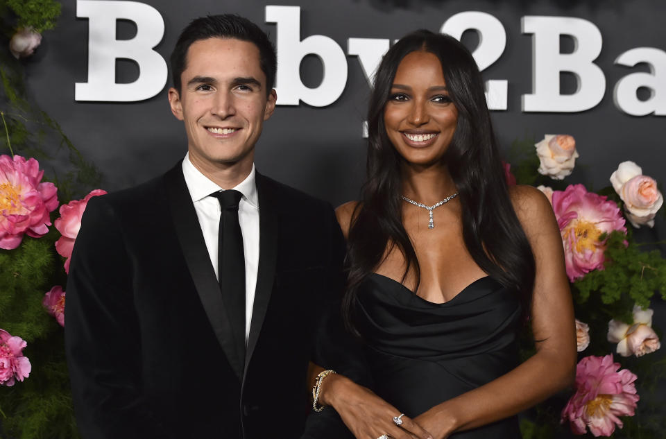 FILE - Juan David Borrero, left, and Jasmine Tookes arrive at the 2022 Baby2Baby Gala in West Hollywood, Calif., on Nov. 12, 2022. Tookes announced her pregnancy on Instagram on Nov. 22. (Photo by Jordan Strauss/Invision/AP, File)