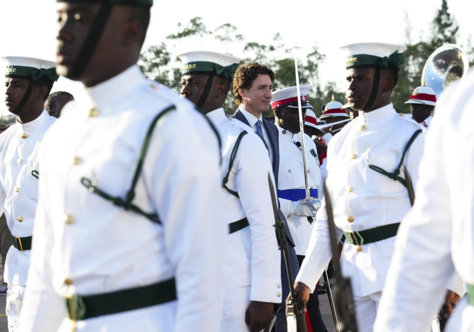 Canada Prime Minister Justin Trudeau arrives in Nassau, Bahamas, on Wednesday, Feb. 15, 2023. Trudeau will be attending the Conference of Heads of Government of the Caribbean Community. (Sean Kilpatrick/The Canadian Press via AP)