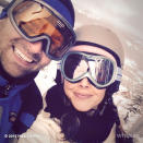 The twosome got cozy on the chairlift before hitting the slopes.