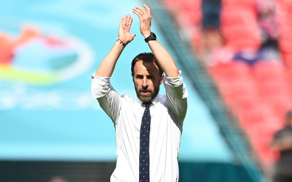 For editorial news reporting purposes only. Images must appear as still images and must not emulate match action video footage. Photographs published in online publications shall have an interval of at least 20 seconds between the posting.) Mandatory Credit: Photo by Andy Rain/POOL/EPA-EFE/Shutterstock (12071214co) England manager Gareth Southgate applauds the fans after the UEFA EURO 2020 group D preliminary round soccer match between England and Croatia in London, Britain, 13 June 2021 - Andy Rain/POOL/EPA-EFE/Shutterstock 