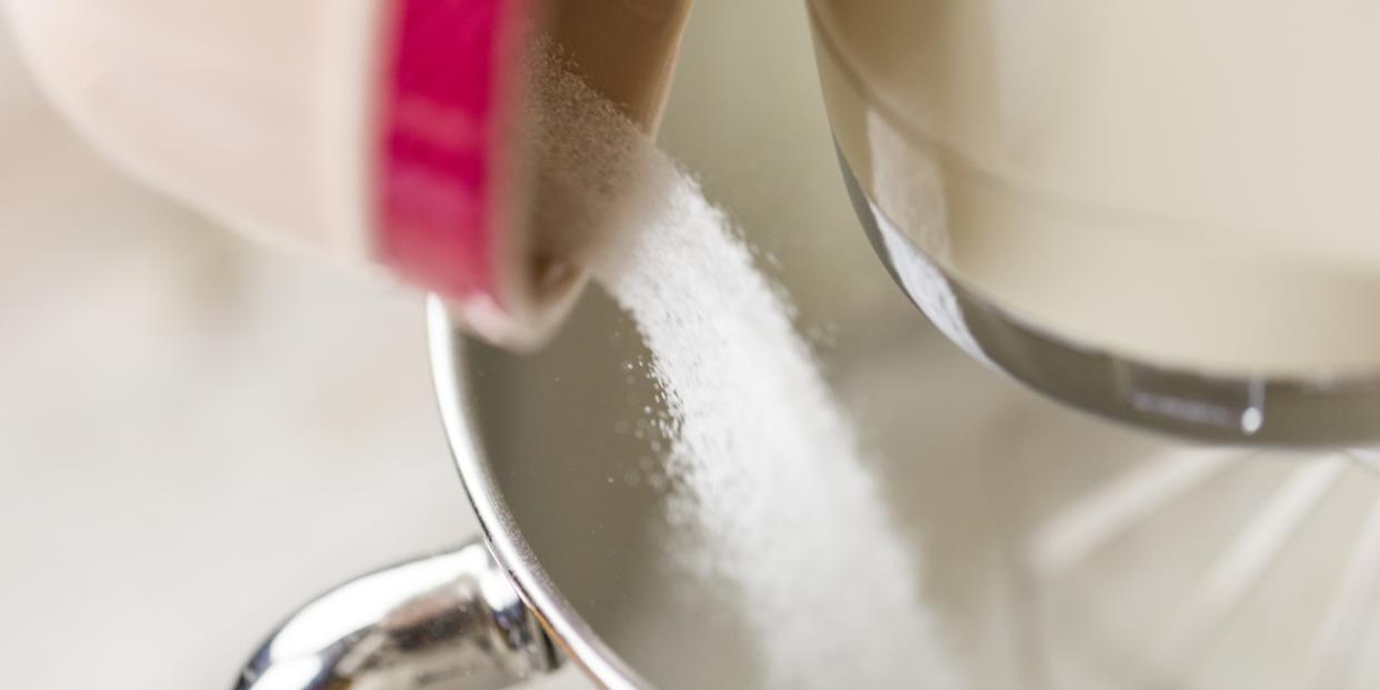 sugar being poured into mixer worldwide sugar shortage