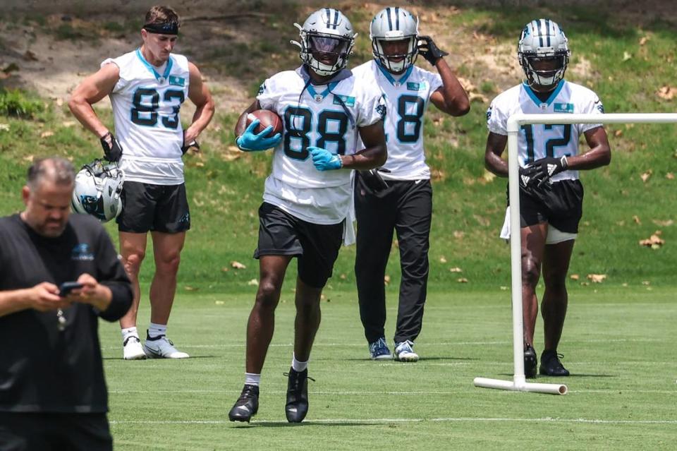 Panthers wide receiver Terrace Marshall, Jr., third from left, runs through a drill during day two of mini camp on Wednesday, June 15, 2022 in Charlotte, NC.