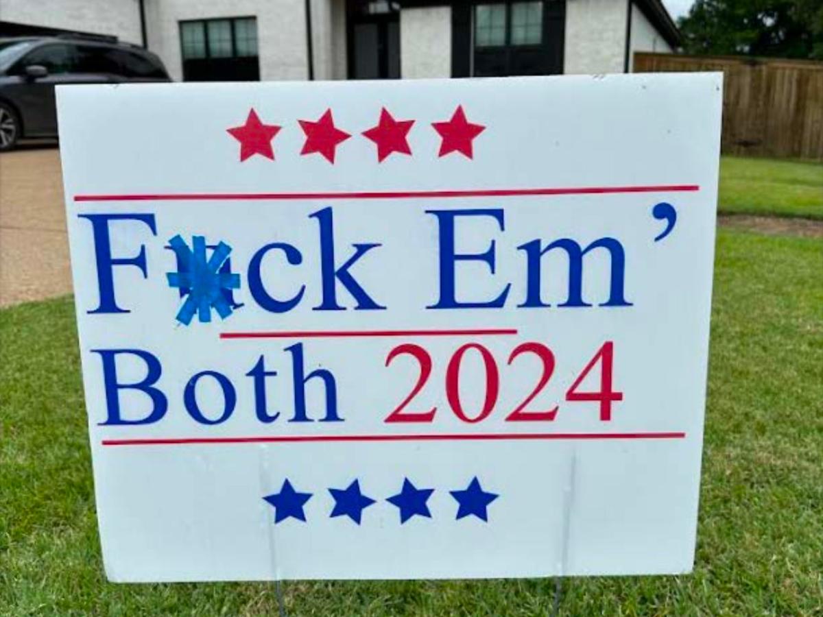 A Tennessee woman who hates both Trump and Biden has won a ,000 lawsuit against her city after it fined her for a vulgar yard sign.