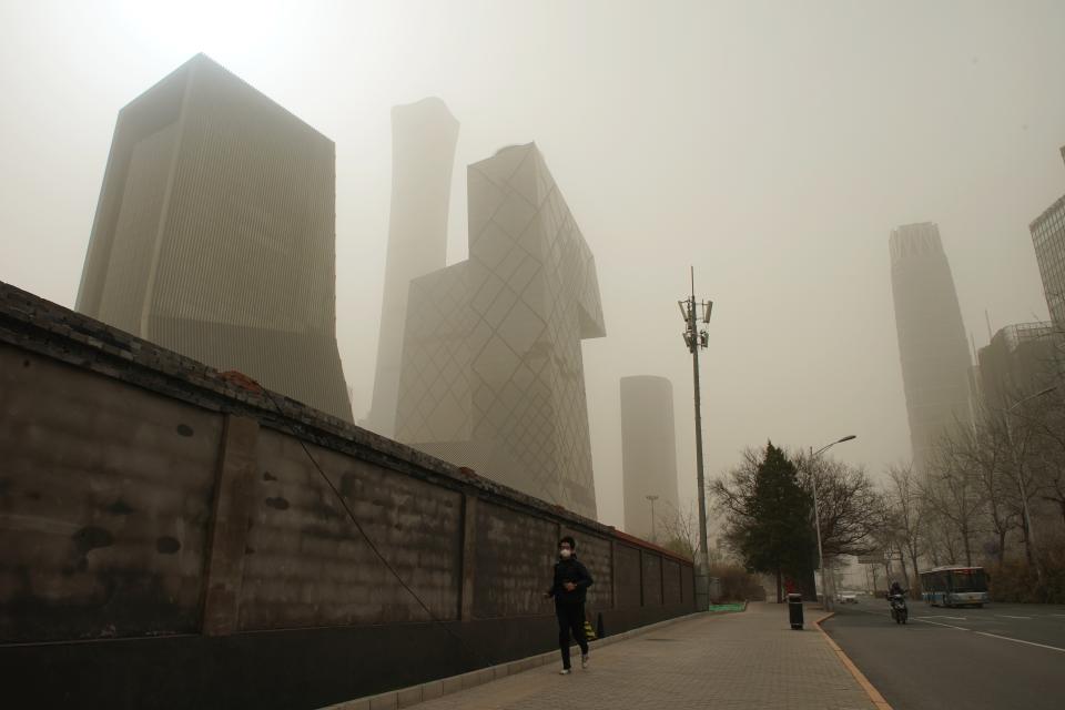 BEIJING, March 28, 2021 -- A man walks on a road in Beijing, capital of China, March 28, 2021. (Photo by Ju Huanzong/Xinhua via Getty) (Xinhua/Ju Huanzong via Getty Images)