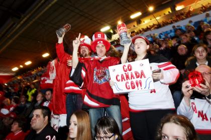 Supporters of Team Canada cheer during the 2016 IIHF World Junior Ice Hockey Championship match between USA and Canada in Helsinki, Finland, December 26, 2015. Team USA won Canada 4-2.  REUTERS/Roni Rekomaa/Lehtikuva       ATTENTION EDITORS - THIS IMAGE WAS PROVIDED BY A THIRD PARTY. FOR EDITORIAL USE ONLY. NOT FOR SALE FOR MARKETING OR ADVERTISING CAMPAIGNS. THIS PICTURE IS DISTRIBUTED EXACTLY AS RECEIVED BY REUTERS, AS A SERVICE TO CLIENTS. NO THIRD PARTY SALES. NOT FOR USE BY REUTERS THIRD PARTY DISTRIBUTORS. FINLAND OUT. NO COMMERCIAL OR EDITORIAL SALES IN FINLAND.