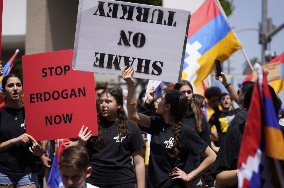 Armenian Americans youth commemorate the 108th anniversary of the Armenian Genocide Remembrance Day with a protest outside the Consulate of Turkey in Beverly Hills, Calif., Monday, April 24, 2023. (AP Photo/Damian Dovarganes)