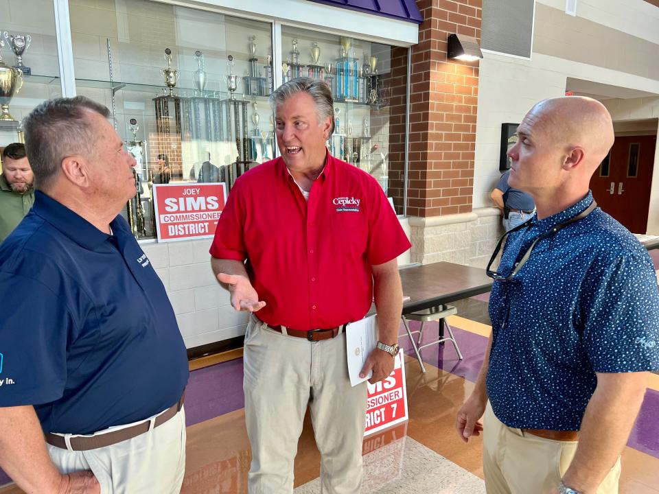 From left, former Spring Hill Mayor Rick Graham, State Rep. Scott Cepicky and District 5 County Commission candidate Vincent Fuqua speak at Tuesday's Meet the Candidates event at Central High School.