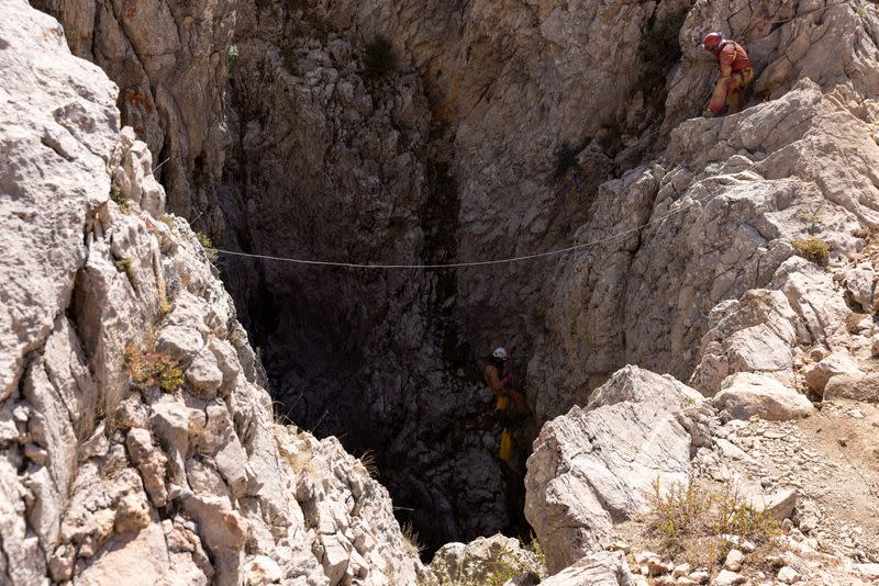 Rescuers race to save ill US cave explorer trapped 3,000 feet underground in Turkey