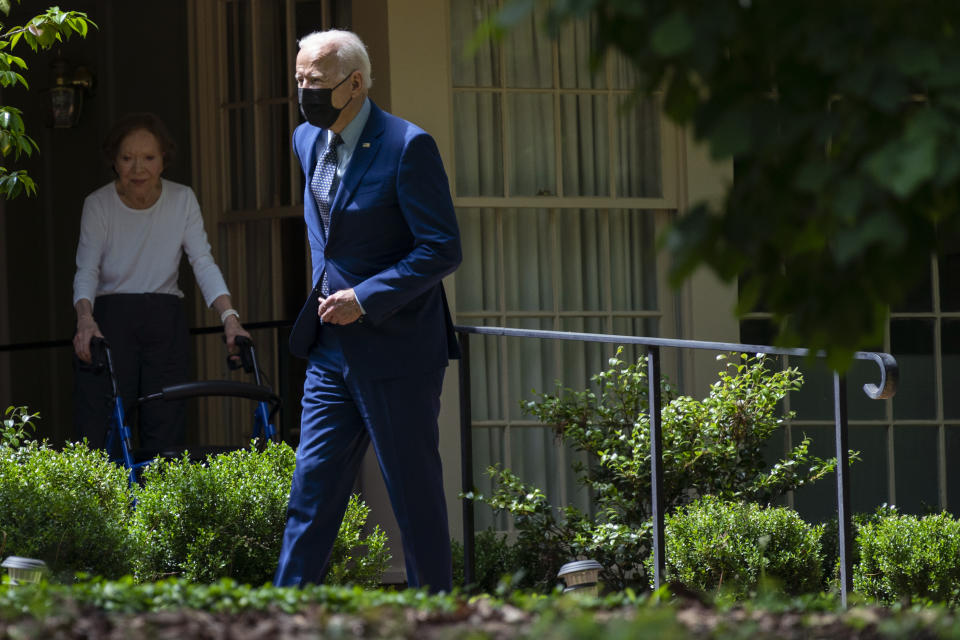 Former first lady Rosalynn Carter looks on as President Joe Biden leaves the home of former President Jimmy Carter during a trip to mark Biden’s 100th day in office, Thursday, April 29, 2021, in Plains, Ga. (AP Photo/Evan Vucci)