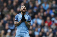 Britain Football Soccer - Manchester City v Chelsea - Premier League - Etihad Stadium - 3/12/16 Manchester City's Nicolas Otamendi reacts after being shown a yellow card Reuters / Phil Noble Livepic EDITORIAL USE ONLY. No use with unauthorized audio, video, data, fixture lists, club/league logos or "live" services. Online in-match use limited to 45 images, no video emulation. No use in betting, games or single club/league/player publications. Please contact your account representative for further details.