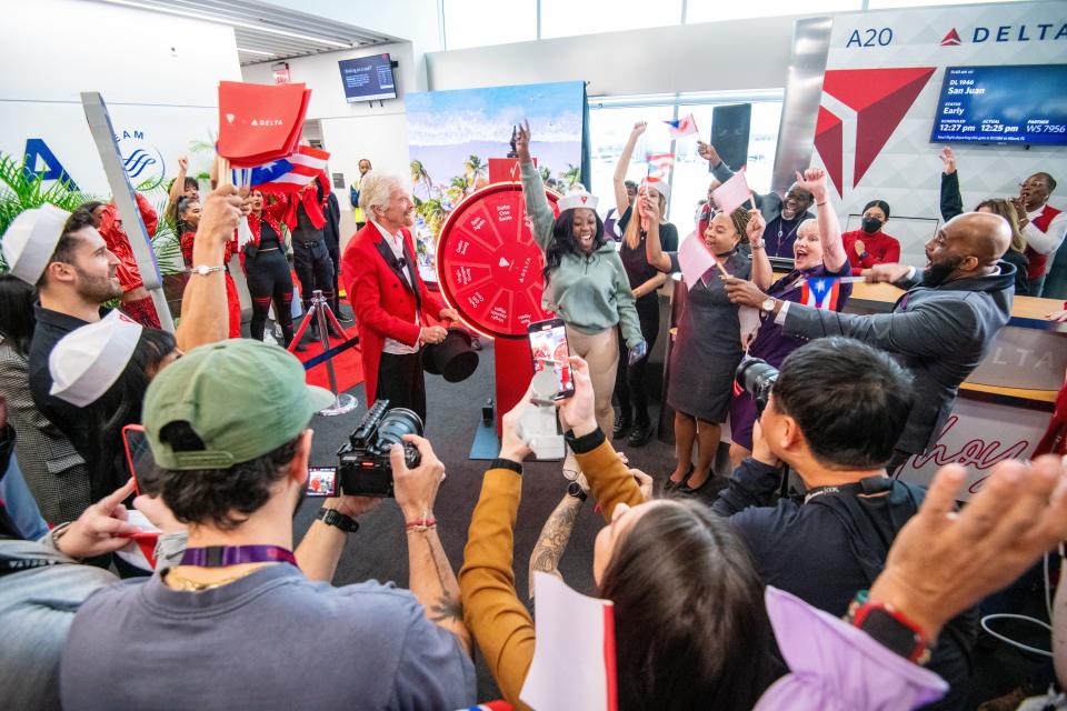 Delta Air Lines ane Virgin Voyages come together to give away a pair of tickets to each passenger on a flight to San Juan, Puerto Rico from Atlanta, Georgia at Hartsfield Jackson international Airport on Thursday February 29, 2024. (Chris Rank/ Rank Studios)