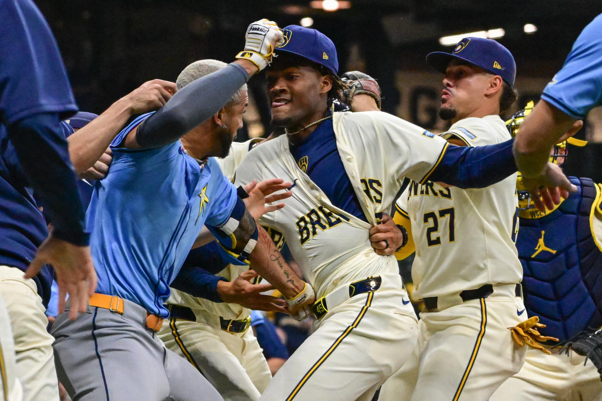 Tampa Bay Rays center fielder Jose Siri (left) and Milwaukee Brewers pitcher Abner Uribe threw punches in a wild brawl in the eighth inning Tuesday. (Benny Sieu/USA Today)
