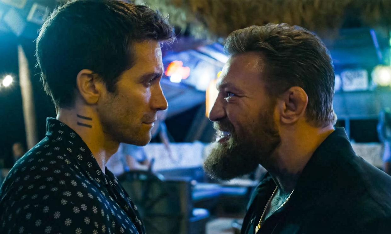 <span>Jake Gyllenhaal and Conor McGregor face off in Road House.</span><span>Photograph: Landmark Media/Alamy</span>