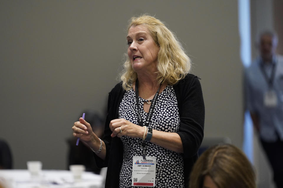 Amy Somary, trustee of the Arlington Heights Memorial Library, asks a question during a panel discussion about understanding and combating book bans at the American Library Association's annual conference and exhibition Friday, June 23, 2023, at McCormick Place in Chicago. (AP Photo/Erin Hooley)