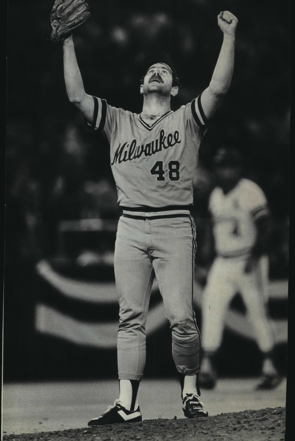 Mike Caldwell raises his arms toward the sky after recording the final out of Game 1 of the 1982 World Series.