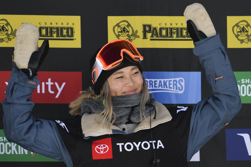 Gold medalist Chloe Kim of the United States celebrates after winning the women's snowboard halfpipe final at the freestyle ski and snowboard world championships, Friday, Feb. 8, 2019, in Park City, Utah. (AP Photo/Alex Goodlett)