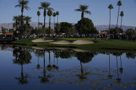 Phil Mickelson puts on the fourth green during the first round of the American Express golf tournament at La Quinta Country Club Thursday, Jan. 20, 2022, in La Quinta, Calif. (AP Photo/Marcio Jose Sanchez)