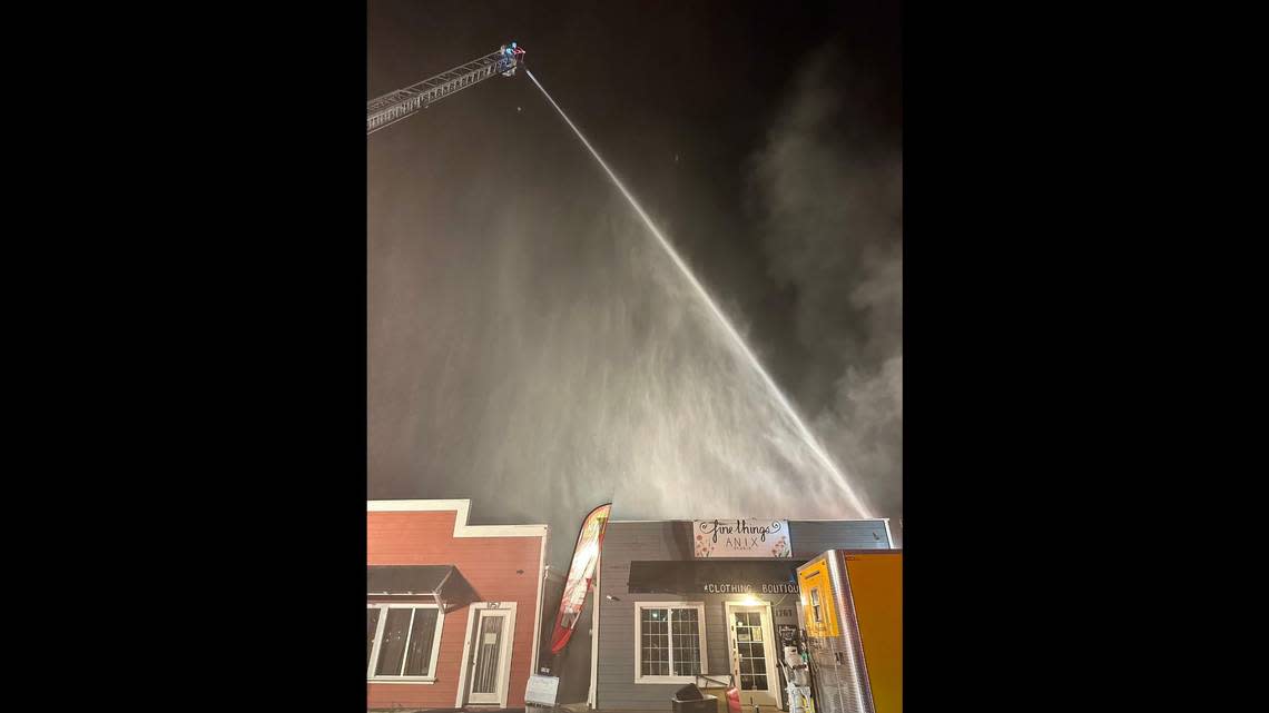 Firefighters work to extinguish a blaze Los Tamales Poblanos Mexican Food on Front Street in Oceano early Friday morning May 12, 2023.