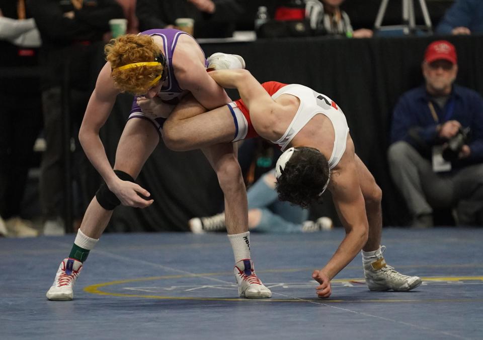 Honeoye Falls-Lima's Chris Noto wrestles BGAH's Darren Florence in a 110-pound semifinal match at the NYSPHSAA Wrestling Championships at MVP Arena in Albany, on Saturday, February 25, 2023.