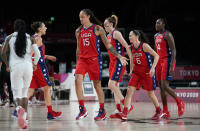 United States of America players celebrate after a three point basket during women's basketball preliminary round game against Nigeria at the 2020 Summer Olympics, Tuesday, July 27, 2021, in Saitama, Japan. (AP Photo/Charlie Neibergall)