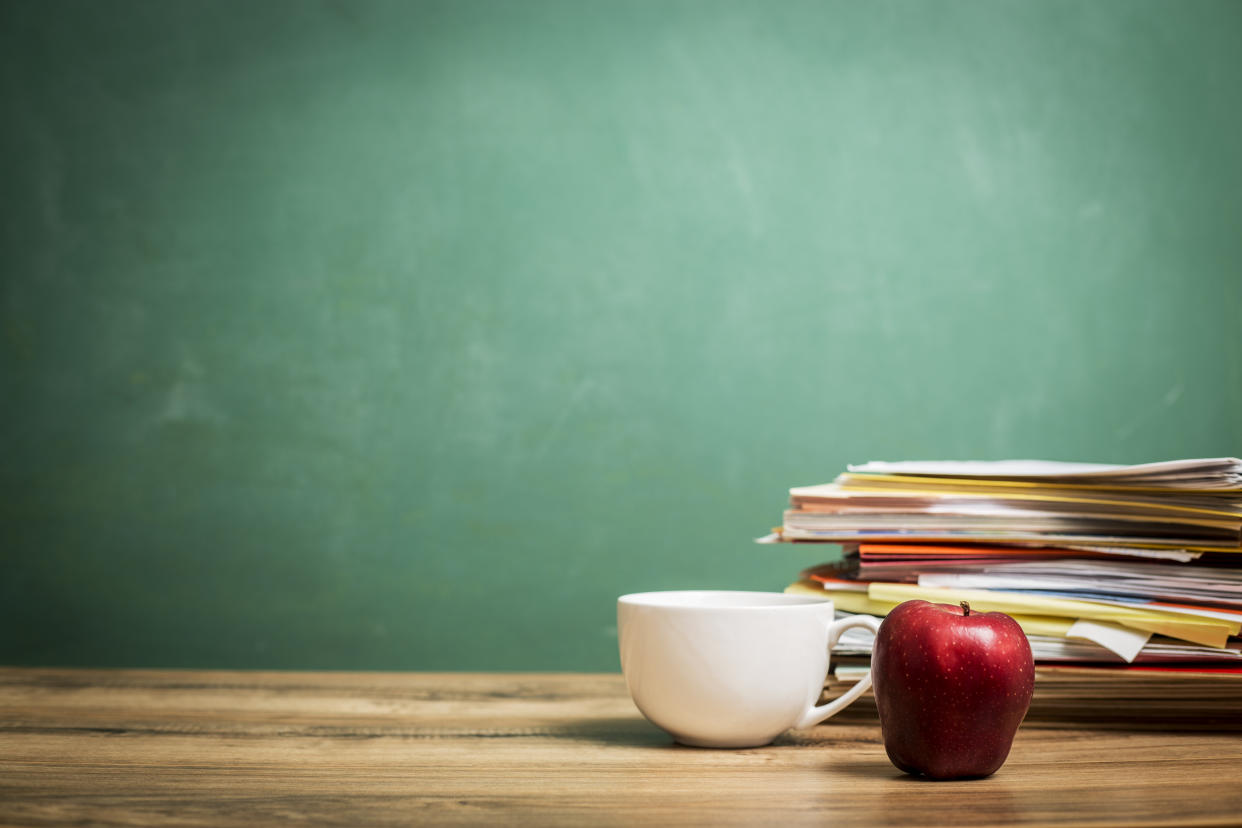 Think before you buy that apple-themed coffee mug for your kid's teacher. It's been (another) tough year and teachers deserve a gift they really want this holiday season. (Photo: Getty Creative)