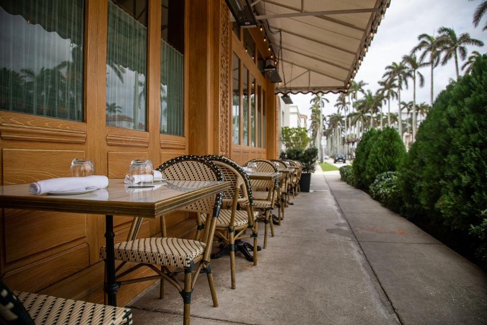 La Goulue, seen here on Monday, is one of several restaurants that have turned to outdoor heaters to keep diners comfortable during a winter season marked by cold fronts, rain and cloudy skies.
