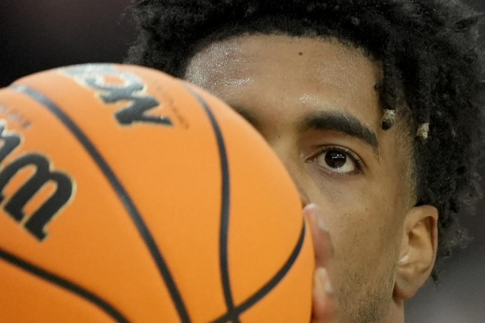 Alabama guard Aaron Estrada (55) practices ahead of a Final Four college basketball game in the NCAA Tournament, Friday, April 5, 2024, in Glendale, Ariz. UConn plays Alabama on Saturday. (AP Photo/David J. Phillip)