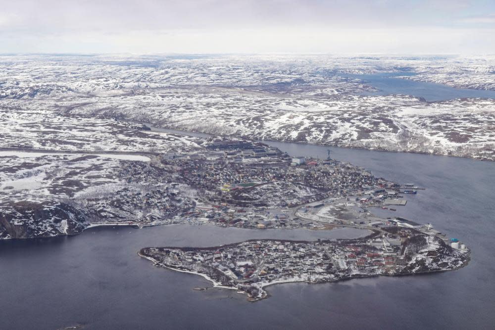 Aerial view of a snow-covered coastline