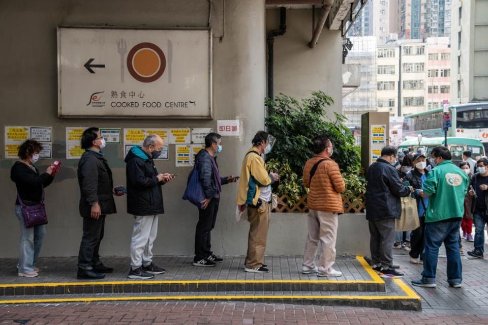 <div class="inline-image__caption"><p>Hong Kong residents line up to receive their free COVID-19 vaccination. </p></div> <div class="inline-image__credit">Photo by Ben Marans/SOPA Images/LightRocket via Getty Images</div>