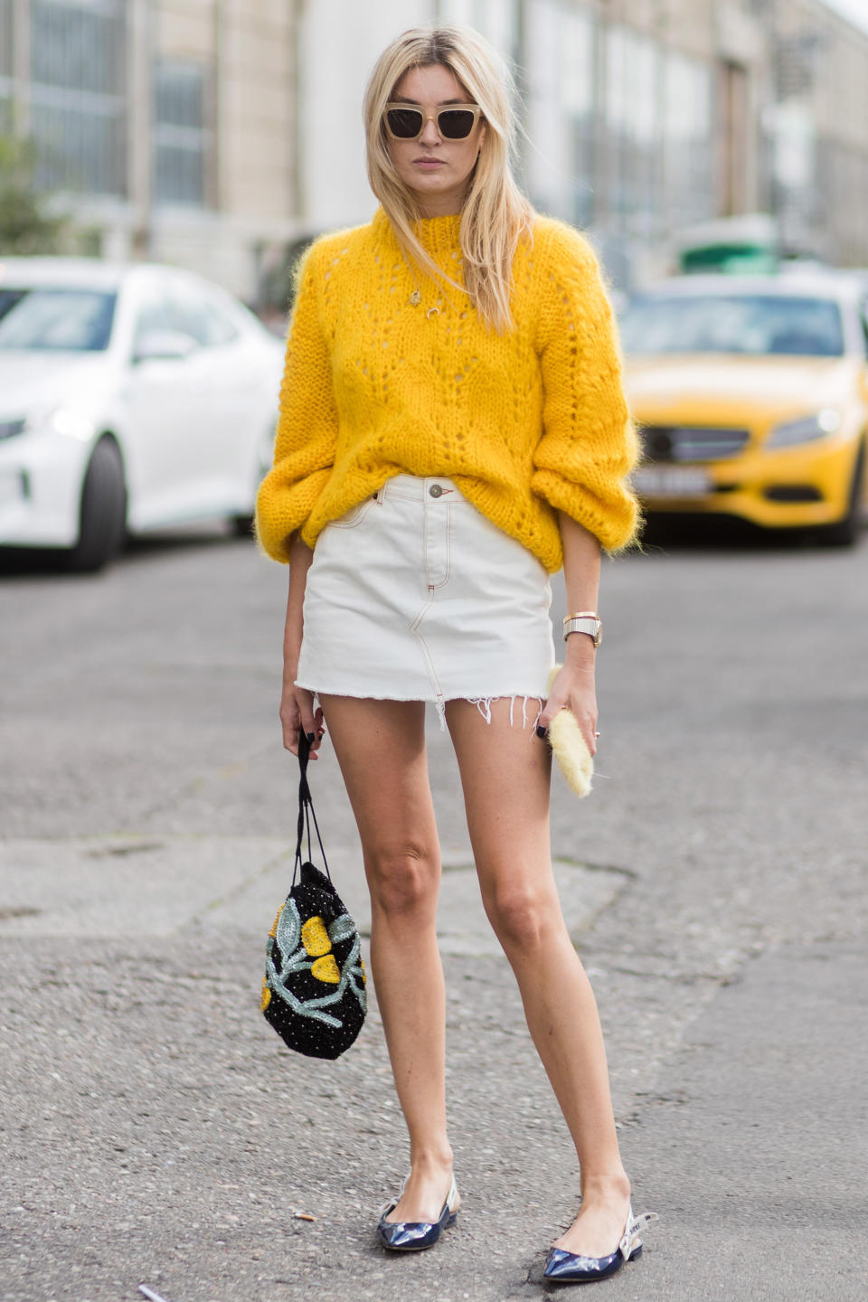 <p>Create the illusion that your legs are much longer than they are by teaming your micro mini with fancy pointy flats á la Camille Charriere.</p>
