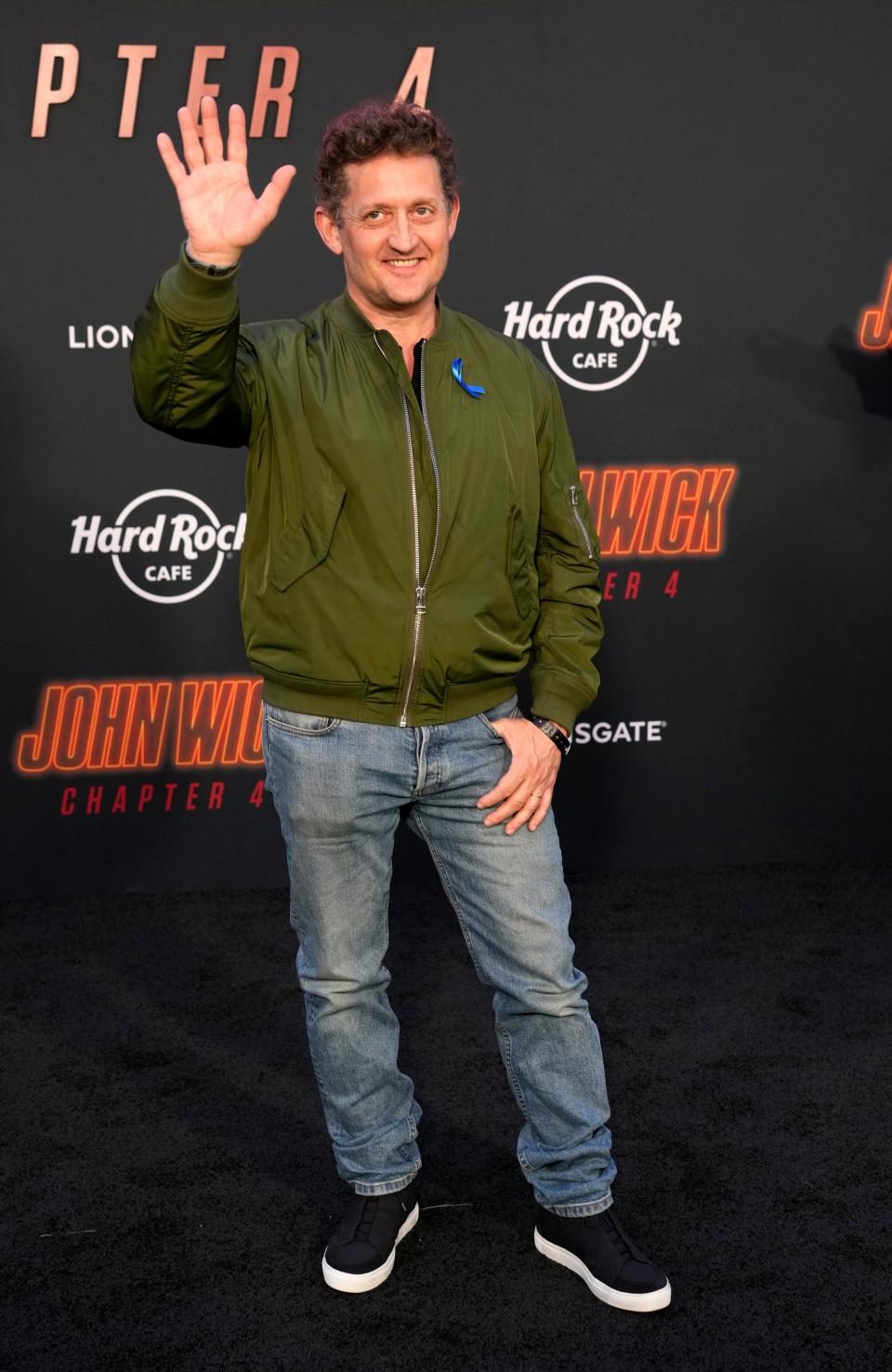 Alex Winter poses at the "John Wick: Chapter 4" premiere.