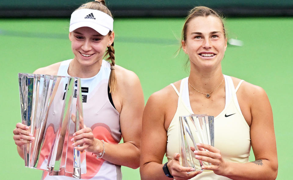 Elena Rybakina and Aryna Sabalenka, pictured here with their respective trophies after the Indian Wells final.