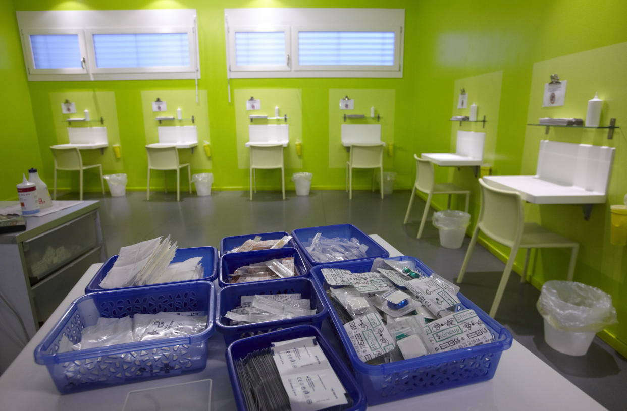 Kits of supplies containing syringes, bandages and antiseptic pads inside a safe injection site in Switzerland. (Photo: Denis Balibouse / Reuters)