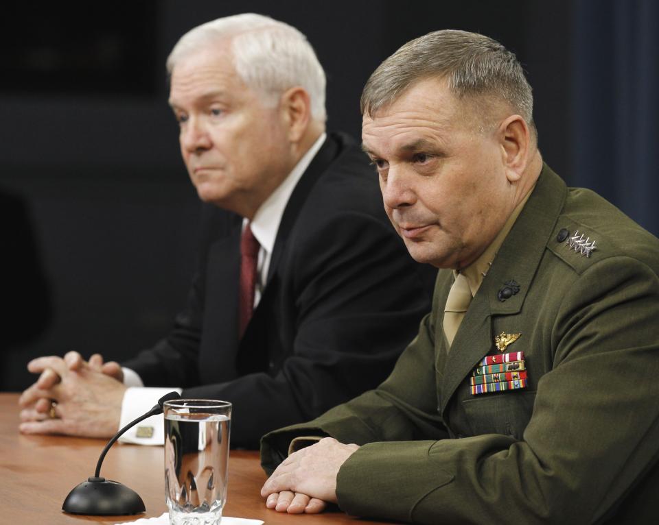 Defense Secretary Robert Gates, left, and Joint Chiefs Vice Chairman Gen. James Cartwright take part in a media availability at the Pentagon in 2011. (Photo: Alex Brandon/AP)