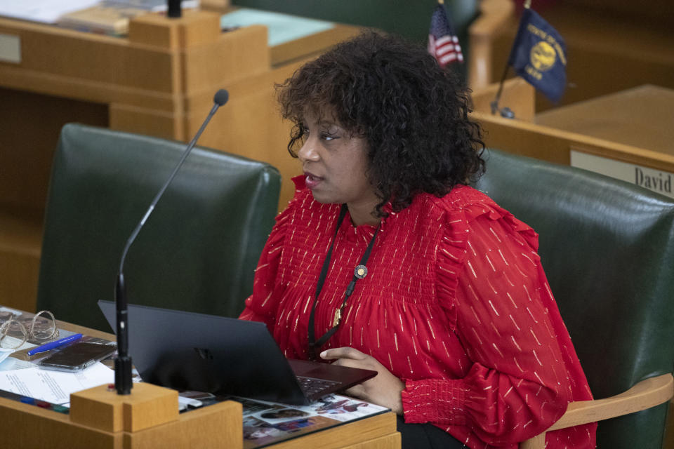  Rep. Janelle Bynum, D-Clackamas, works on the House floor at the Oregon State Capitol in Salem on Tuesday, Feb. 28, 2023. (Amanda Loman/Oregon Capital Chronicle)