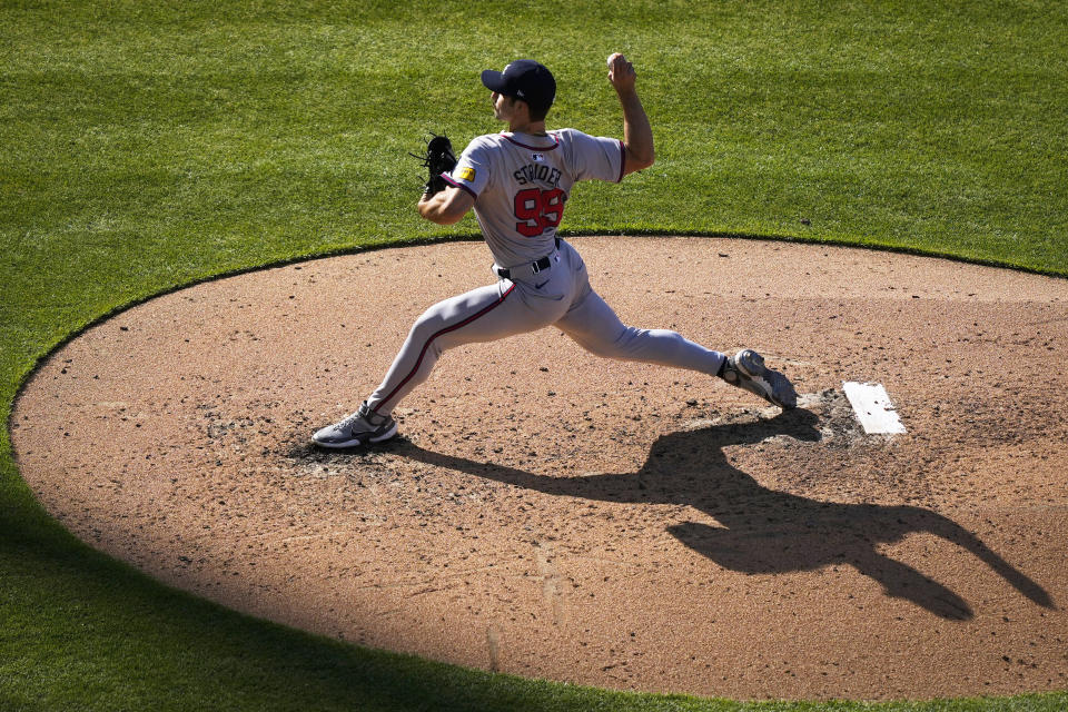 Atlanta Braves' Spencer Strider pitches during the fifth inning of an opening-day baseball game against the Philadelphia Phillies, Friday, March 29, 2024, in Philadelphia. (AP Photo/Matt Rourke)