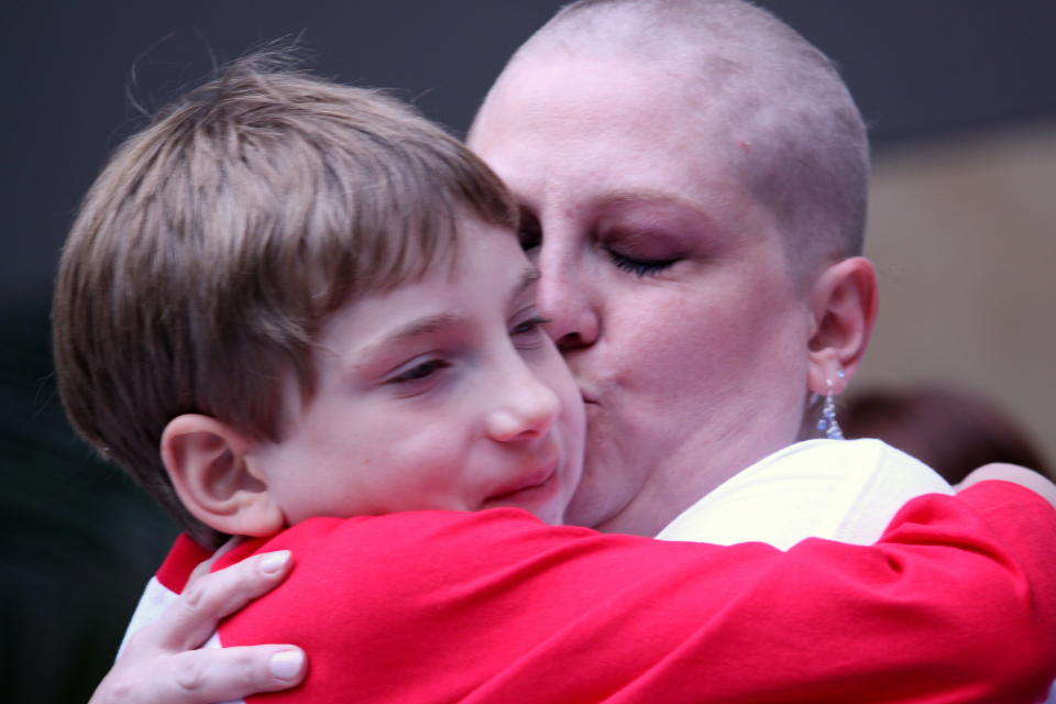 This photo is from September 2010.  I had just shaved my head for St. Baldricks in honor of my son Levi, pictured.  He was diagnosed with stage 4 brain cancer (Medulloblastoma) in 2004 when he was only four.  Surgery to remove the tumor left him mute, paralyzed and incontinent.  He relearned all his life skills while undergoing multiple surgeries, chemotherapy and intense radiation.  He is my hero.