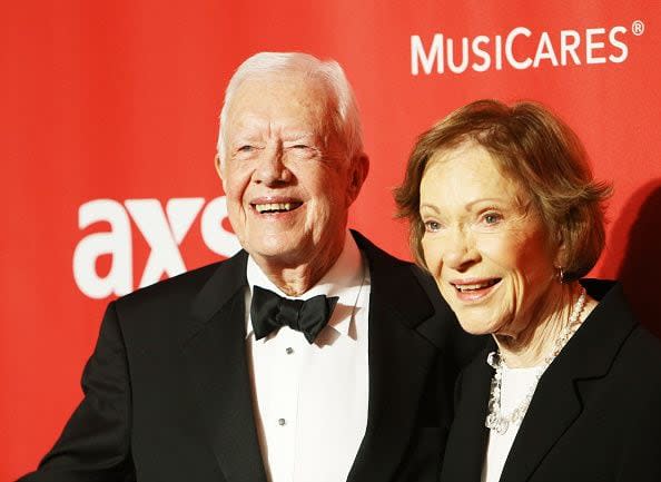 LOS ANGELES, CA - FEBRUARY 06:  Jimmy Carter and Rosalynn Carter arrive at the 2015 MusiCares Person of The Year honoring Bob Dylan held at Los Angeles Convention Center on February 6, 2015 in Los Angeles, California.  (Photo by Michael Tran/FilmMagic)