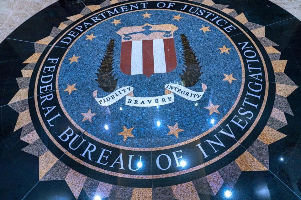 The FBI logo is displayed on the lobby floor of the FBI offices in Indianapolis.